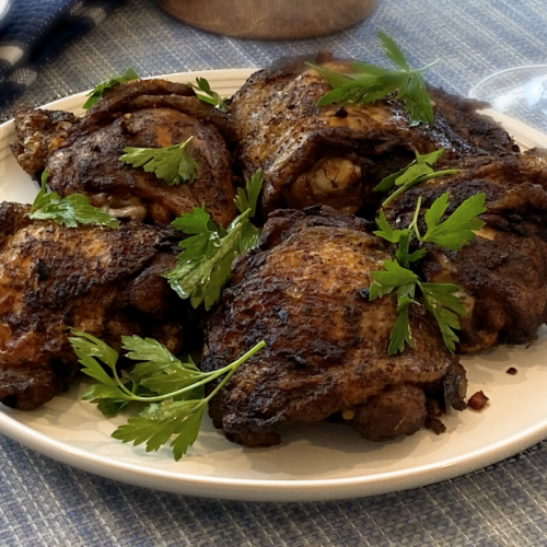 the feature image for dutch oven baked seven spice chicken