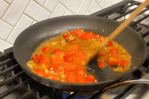 Create the tomato basil sauce for Tomato Basil Salmon Pasta