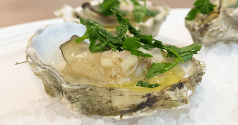 Ready to serve Baked Kumamoto Oysters with Garlic Butter Sauce