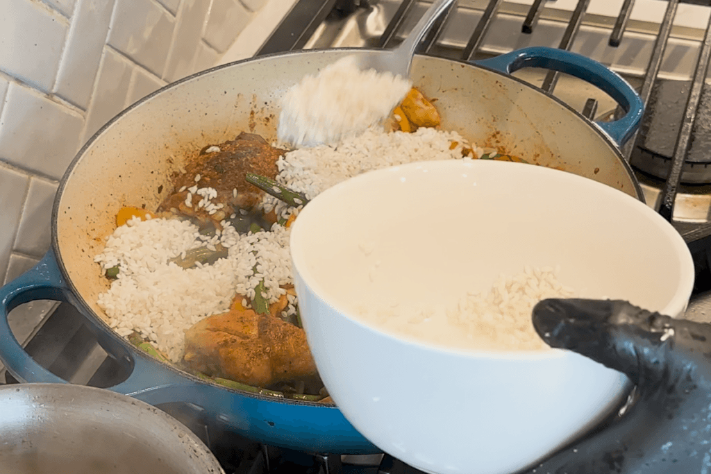 Paella Rice Adding Easy Paella Valenciana: Bring Spain to Your Table - Delishdoers