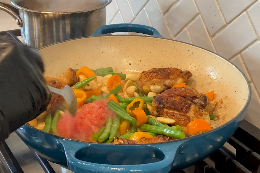 Paella Rice Adding Easy Paella Valenciana: Bring Spain to Your Table - Delishdoers