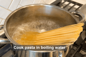Cook pasta for Spaghetti alle Vongole