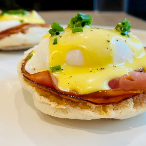 Garnish with black pepper and chives for Egg Benedict