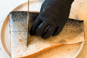Cut a few slits through skin for Crispy Skin Salmon