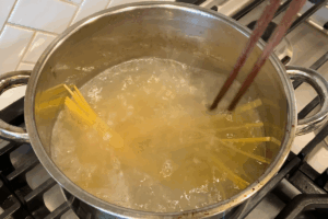 Cook pasta for Spicy Gochujang Buttered Noodles