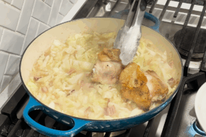 Return the chicken back for Crispy Braised Chicken with Bacon and Cabbage
