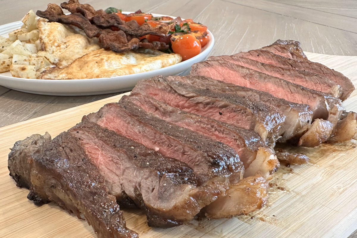Easy Steak and Eggs Breakfast with Potatoes, Bacon, and Tomatoes