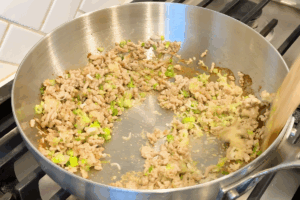 Add aromatics for Easy Spicy Miso Ramen with Ground Pork
