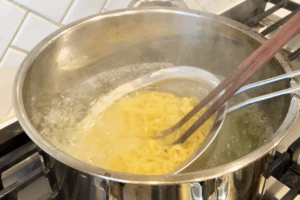 Cook the noodles for Easy Spicy Miso Ramen with Ground Pork