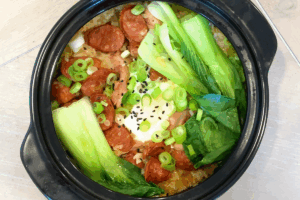 Garnish with green onions for Clay Pot Rice Made Easy