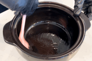 Prepare the clay pot with oil for Clay Pot Rice Made Easy