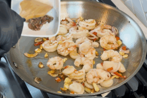 Add anchovies for Garlic Clam and Shrimp Pasta