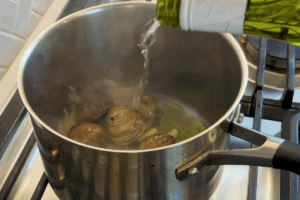 Cook the clams for Garlic Clam and Shrimp Pasta