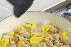 Deglaze and braise for One-Pot Italian Sausage