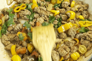 sprinkle freshly chopped parsley for One-Pot Italian Sausage