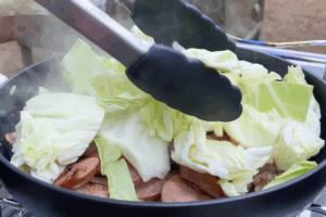 Add the cabbage for Buttery Sausage & Cabbage Stir-Fry
