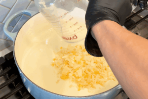 Add the cheese for mac and cheese