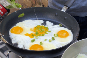 Cook the eggs for Cozy Camping Noodles with Fluffy Eggs