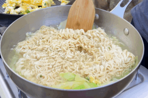 Cook the noodles for Cozy Camping Noodles with Fluffy Eggs