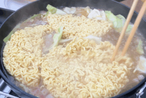 Cook the noodles for Garlic Butter Noodle Soup
