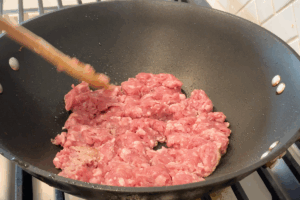 Cook the pork for Golden Pumpkin Pork Stir-Fry