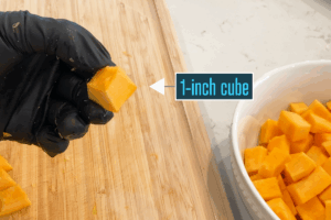 Dice the pumpkin into even 1-inch cubes for Golden Pumpkin Pork Stir-Fry