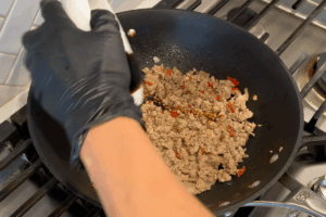 Add the sauce for Easy Basil Pork Stir Fry