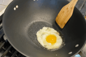Fry an Egg for Basil Pork Stir Fry