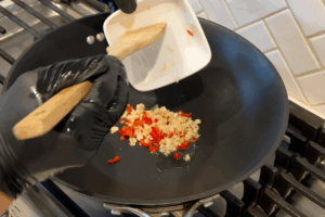 Stir-Fry the Aromatics for Basil Pork Stir Fry