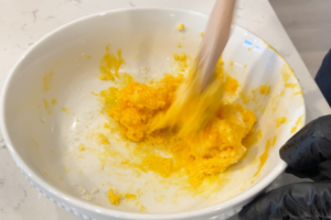 Create egg yolk and cheese mix