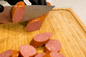 prep the Sausage for One-Pan Sausage and Sauerkraut