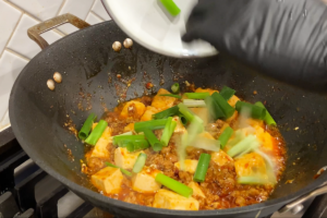 Add green onions for Easy Mapo Tofu